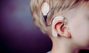 Read more about the article Musical Training Enhances Auditory Rehabilitation in Children with Cochlear Implants: Study